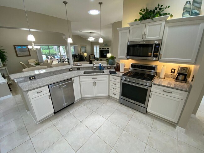 Building Photo - Gorgeous 3 + 2 Turnkey ANNUAL Lease w/Swim Spa & Large Private Screened in Patio In The Village o...