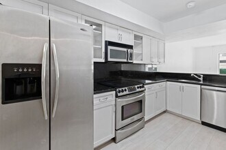 Building Photo - Luxury 2BR Penthouse in Coconut Grove | 1.5 Bath | Prime Miami Location
