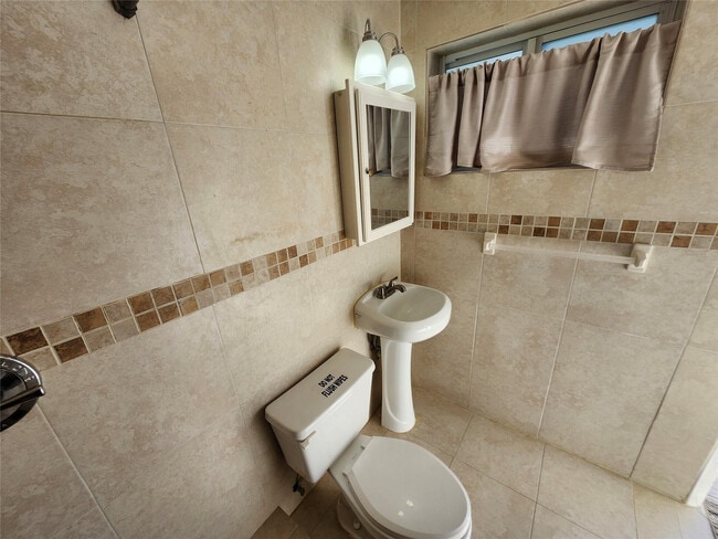 Building Photo - 120 NE 10th Ave