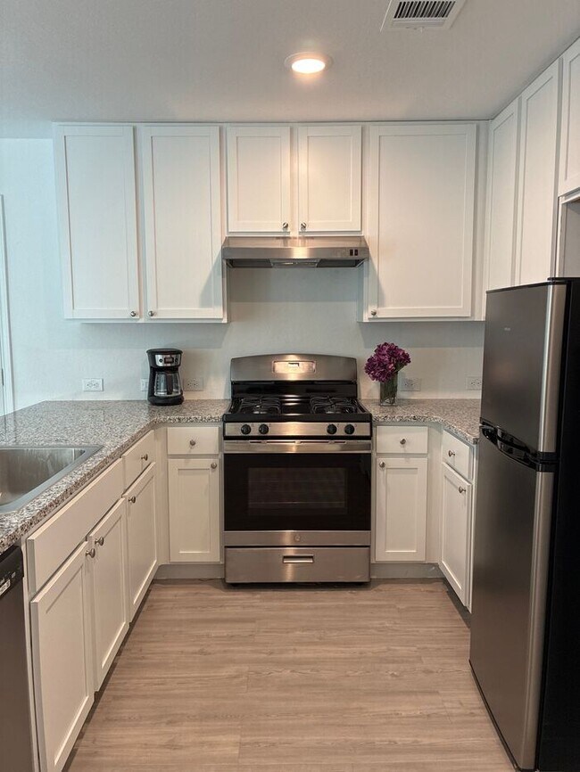 Building Photo - Move In Within 30 Days — Only $1,375! Limited-Time Offer