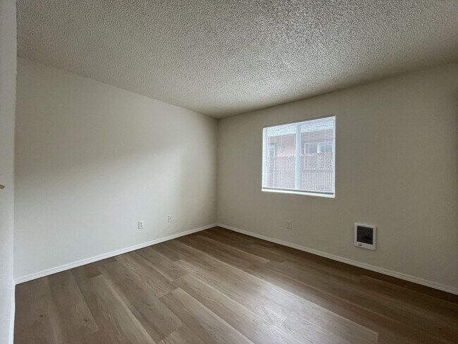 Building Photo - Inviting 2 Bedroom Home with Open Layout, Stainless Steel Appliances & Private Outdoor Retreat