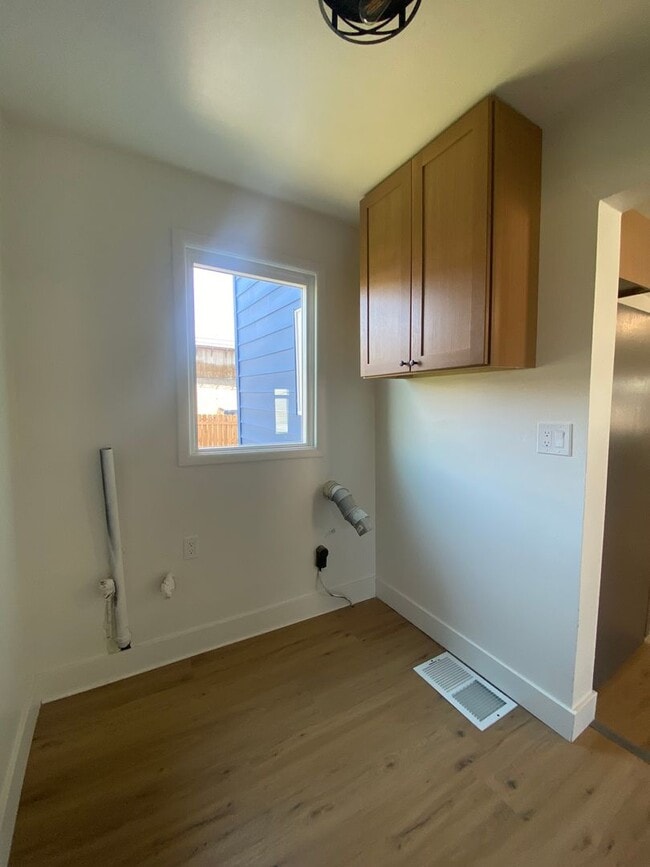 Building Photo - Totally remodeled 3-bedroom, 2-bath available now near Spokane Community College with large shop