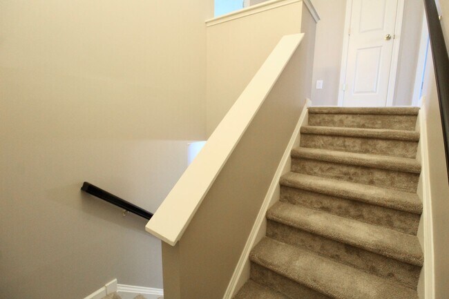 Building Photo - Upscale townhome  with attached garage for rent in the Townes at Bluestone!