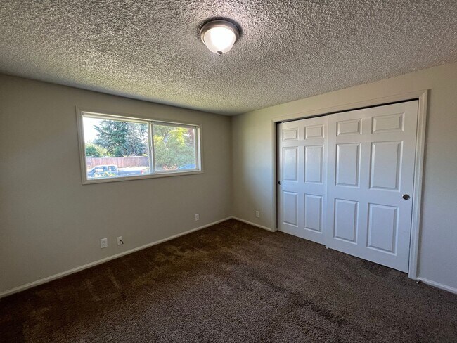 Building Photo - Beautifully Landscaped Two Bedroom