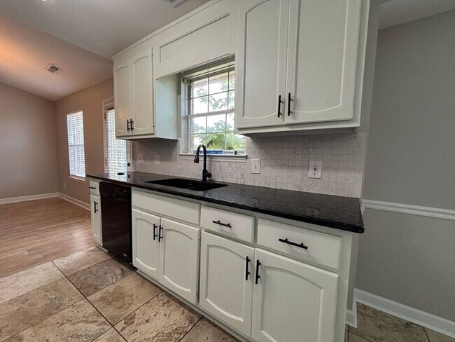 Building Photo - You will LOVE the fenced yard!