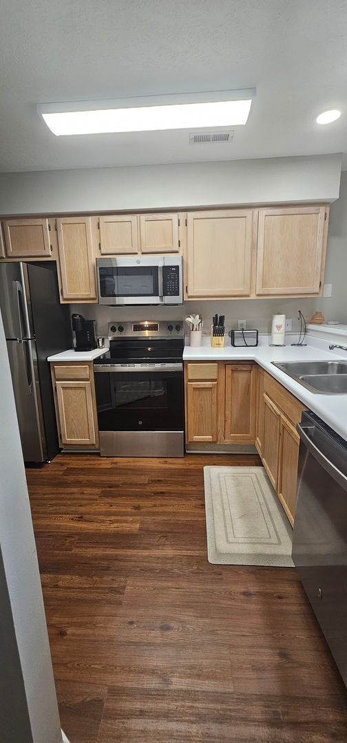 Building Photo - -First-Floor End-Unit | Fully Furnished 2B...