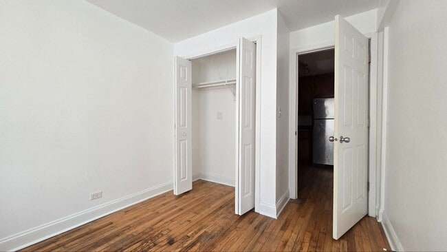 Building Photo - 2BR/1BA in West Ridge – In-Unit Laundry, A/C, Pet Friendly