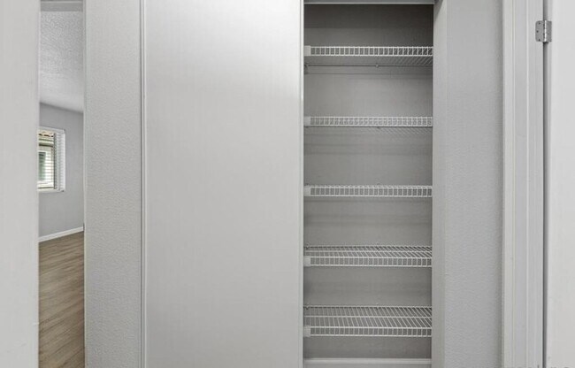 Building Photo - Remodeled Upper-Level 1BR Condo with Balcony & Garage Parking in Verano Community