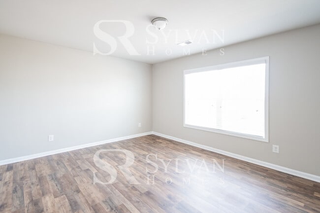 Building Photo - Embrace the charm of this 4 BR, 2.5 BA home