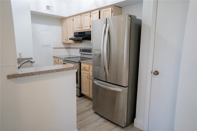 Building Photo - 1865 Palm Cove Blvd