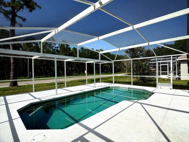 Building Photo - Lovely 4-Bed 2 Bath Pool Home in the Desirable Four Corners Area! Lawn Care & Pool Maintenance In...