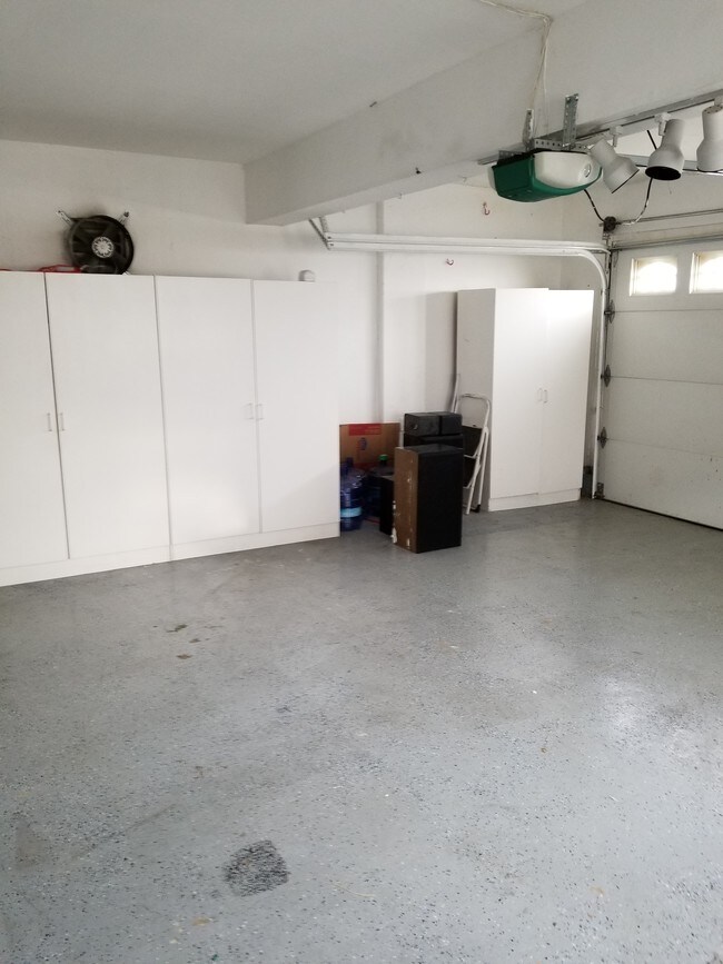 2 car garage with storage cabinets - 19945 Eagle Ridge Ln