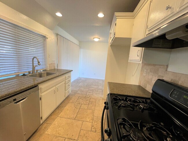 Building Photo - Todd Ranch Townhome- Enjoy The Community Pool!