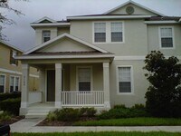 Building Photo - MOVE IN SPECIAL- Beautiful 3/2.5 Harmony Condo.