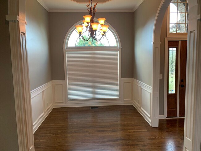 Building Photo - Luxury Living! Beautiful Brick Home in Sango with 3 car garage.