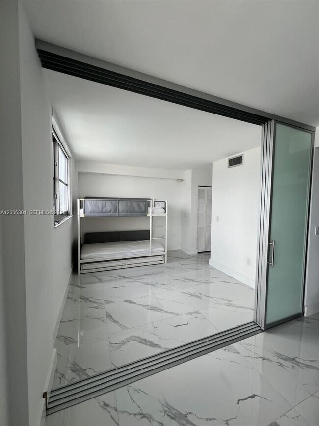 Building Photo - 9273 Collins Ave