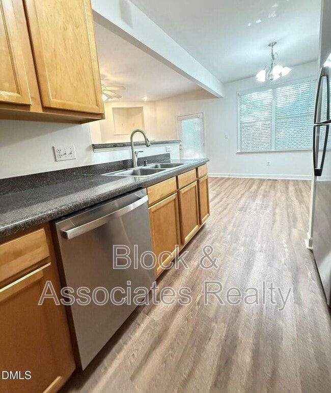 Building Photo - 5523 Cottonrose Ln
