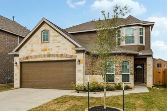 Building Photo - Beautiful stone front 4 bedroom, 3 bath home has bay windows in breakfast nook & master. It is on...