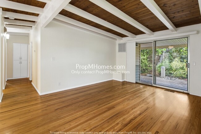 Building Photo - Mid-Century Dream Home: Three Bedrooms and a Converted Garage Await!