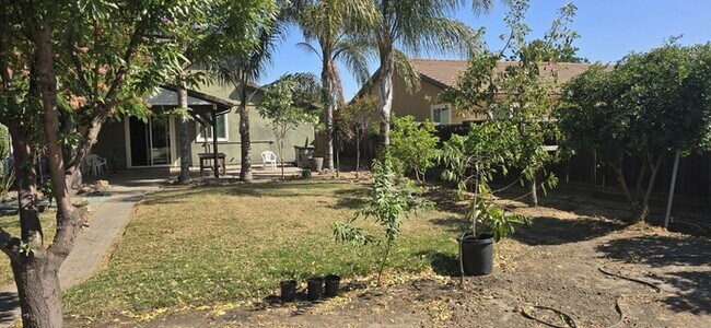Building Photo - This stunning corner home offers 4 spaciou...