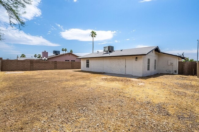 Building Photo - Updated home with large backyard & 2 car g...