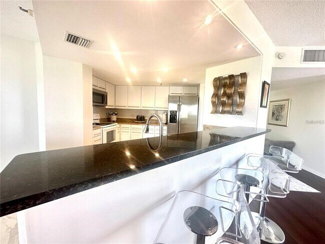 Building Photo - 5950 Pelican Bay Plaza S