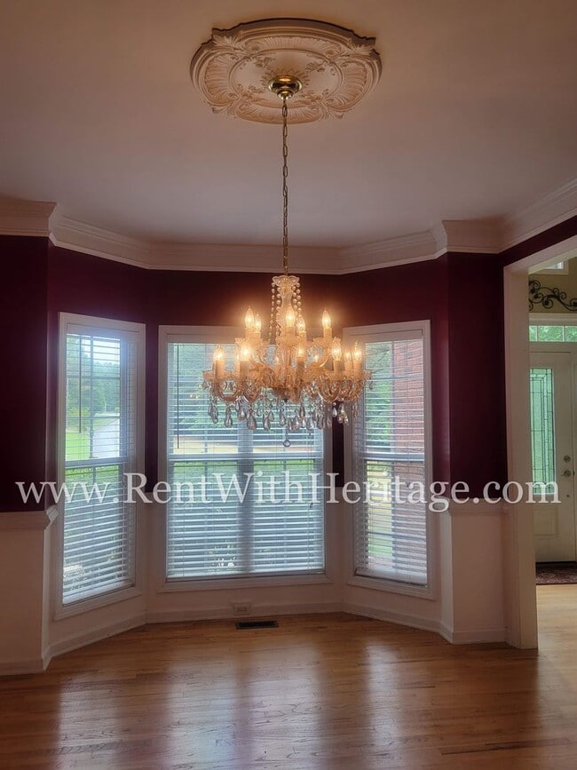 Building Photo - Gorgeous 3-Story Brick Home / 2 Fireplaces / Full Finished Basement / Chapel Hill Schools