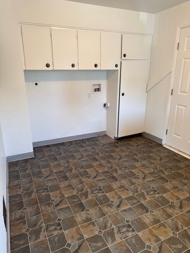 Washer dryer hookups in kitchen - 4603 Otis St