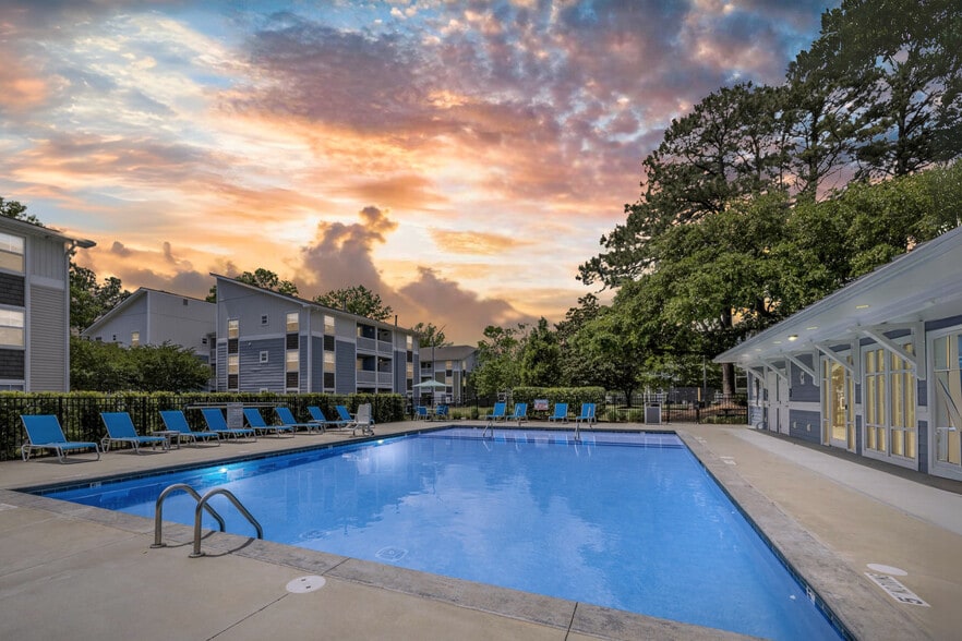Pool Area at Village Green Apartments in Wilmington, NC - Village Green Apartment Homes