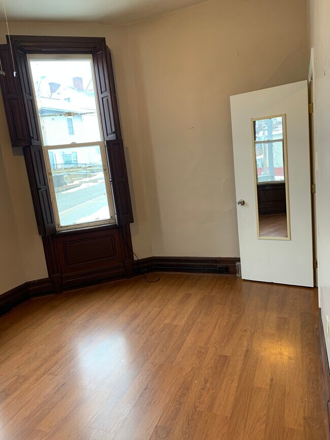 bedroom unit 1 - 128 W 2nd St