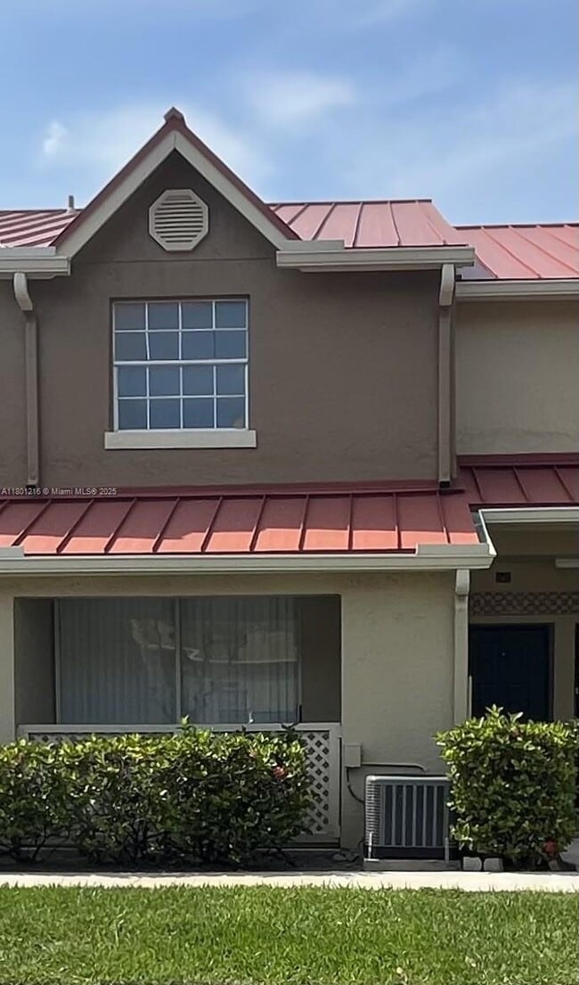 Building Photo - 18352 NW 68th Ave