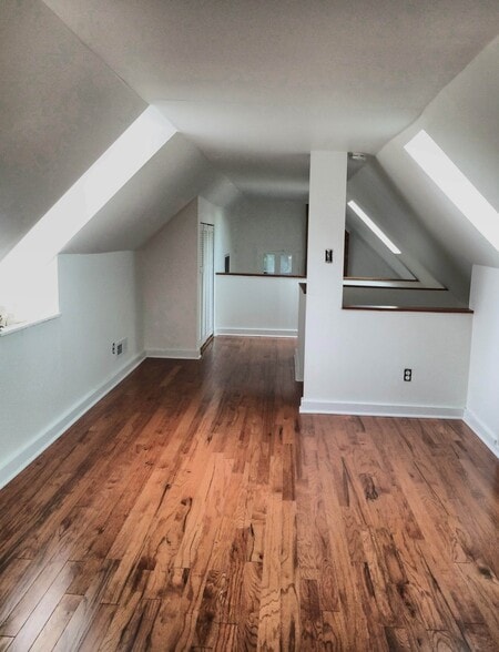 3rd floor attic bedroom has large skylights - 810 E Washington St