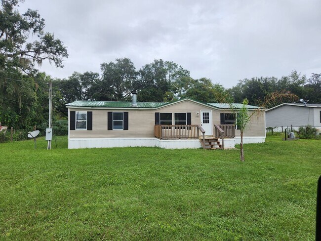 Primary Photo - 3 bed, 2 bath w/ Front & Back Decks, 1/4 Acre of land, FENCED backyard