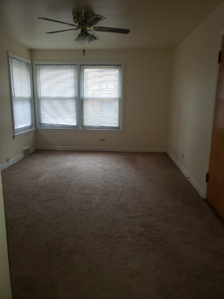 Building Photo - 9103 Lamon Ave