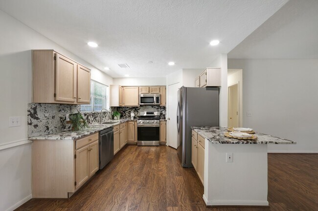 Building Photo - 8910 Driftstone Dr