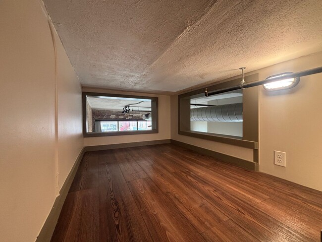Building Photo - Move Downtown on Park Central Square 2 bed...