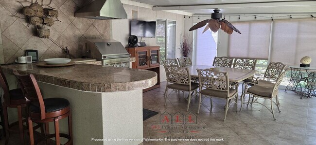 Building Photo - 3 Bed | 2 Bath Home with Office, Sunroom, Outdoor Kitchen & Backyard Oasis
