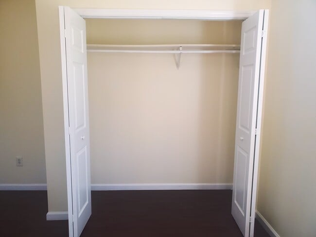 Coat closet by front door - 124 W Shore Rd
