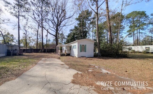 Building Photo - 11442 Hobart Blvd