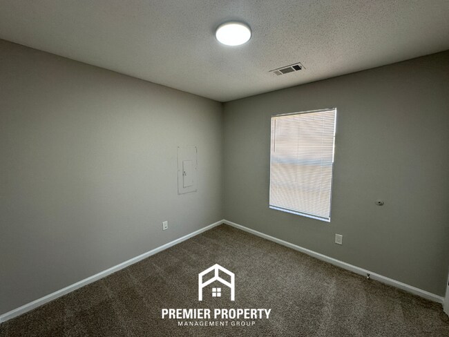 Building Photo - Spacious 4BR/2BA Home in 38141 | Vinyl Flooring & Large Fenced Backyard