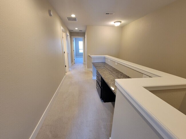 Building Photo - Spacious 3 level, 4 bedroom townhome with attached 2 car garage at Silver Meadows Townhomes on Lo...
