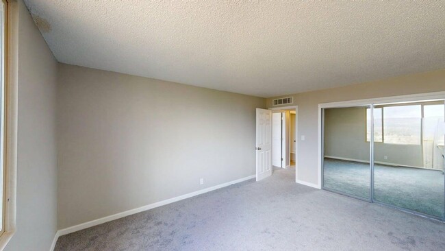 Building Photo - Updated Cochiti Lake Townhome with Views, Garage, Kiva Fireplace & Balcony