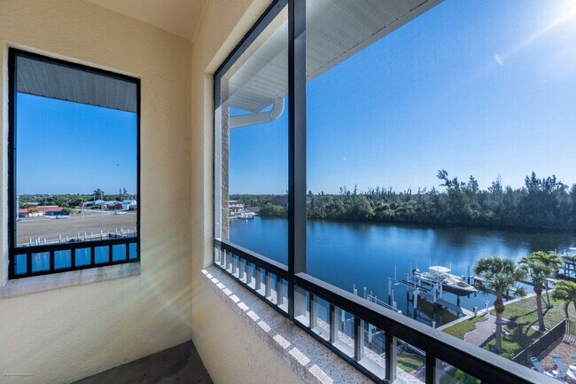Building Photo - PRICE DROP!! Luxury Waterfront Living with Deeded Dock – Punta Gorda Isles