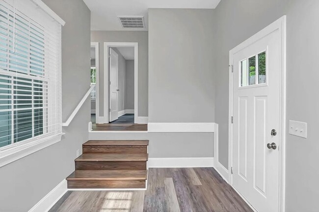 Building Photo - Beautifully renovated and repurposed house