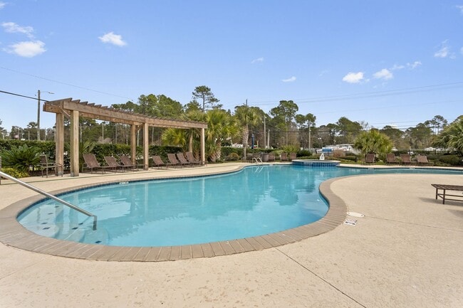 Building Photo - Welcome to Coastal Living at Harbor Landing Condominiums!