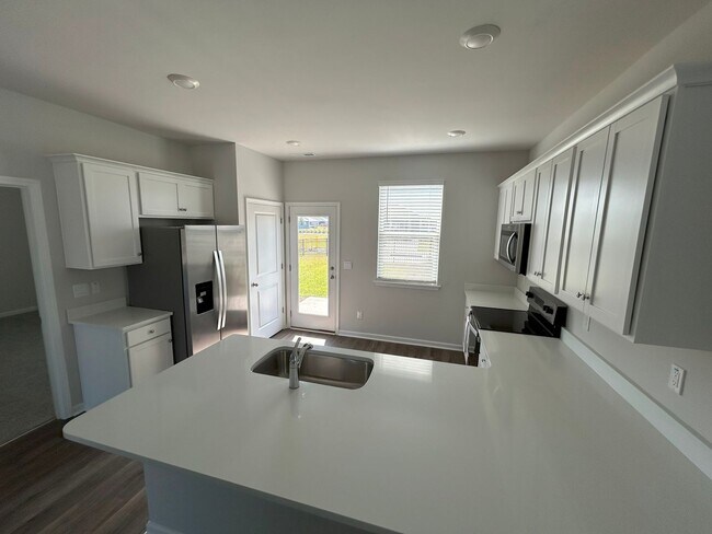 Building Photo - SPECIAL- 1 month free!! Brand new home wit...