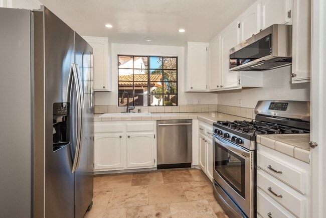 Building Photo - Spacious Mesa Condo with Full Two Car Attached Garage! Pet Friendly!