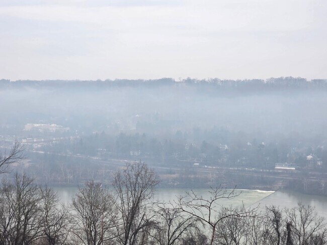 Building Photo - Luxury 4-Bedroom Townhome with Finished Walkout Basement & River Views