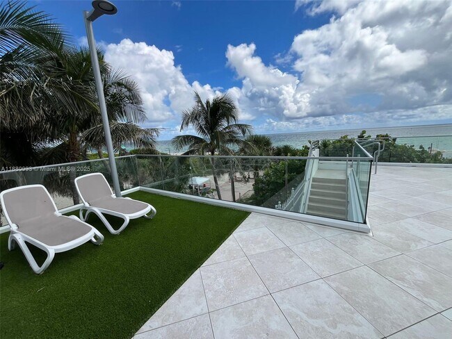 Building Photo - 7135 Collins Ave