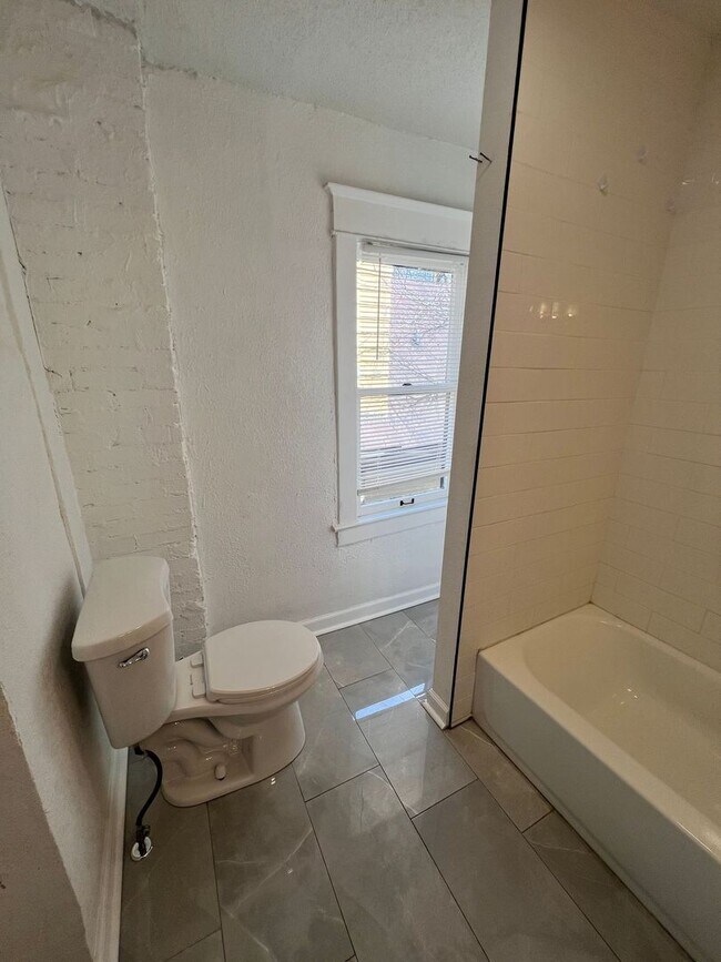 Building Photo - Inviting 3-Bedroom Home with Front Porch Charm